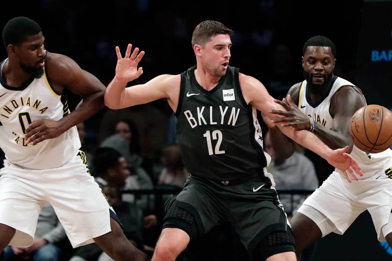 哈里斯(中)的NBA生涯前兩季都在騎士跑龍套，直到他轉戰籃網之後，才因為許多因素意外獲得重用，也開始了他的籃球春天。 歐新社資料照片